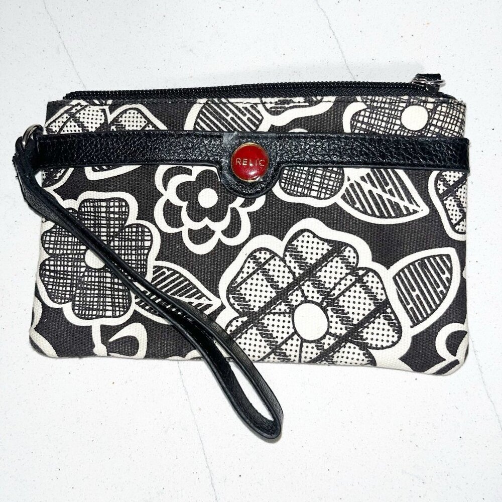Relic wristlet wallet black and white floral pattern and a red logo snap closure